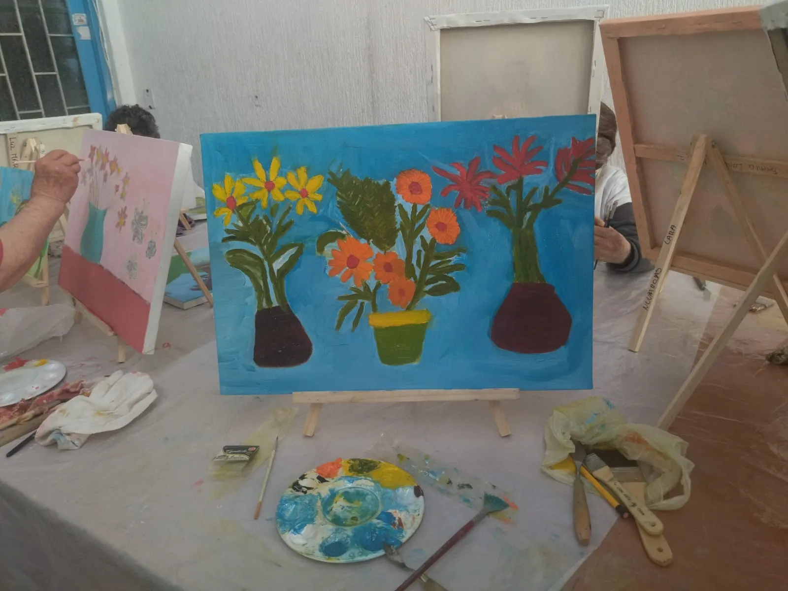 Pintura de floreros y flores